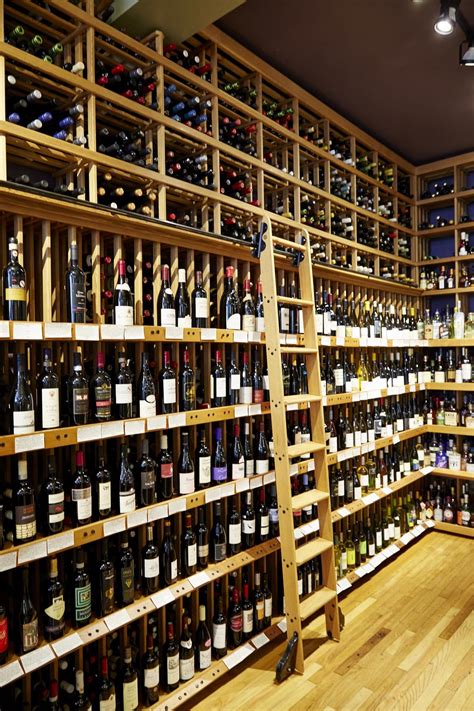 A Wine Cellar Filled With Lots Of Bottles