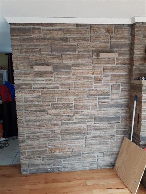 A few slender open shelves installed on the wall would complement the look nicely without covering up the wall. How to cover brick wall - DoItYourself.com Community Forums