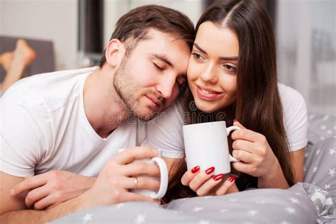 Happy Couple Having Fun In Bedyoung Couple In Bedroom Enjoying Each Other Stock Image Image