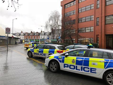 Police officers bring down suicidal man from edge of Swindon town