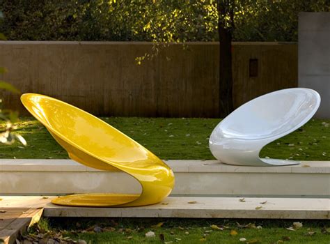 We have both zinc coated and plastic chairs to last outdoors. Modern Outdoor Chair Disk by Karim Rashid | Modern Outdoors