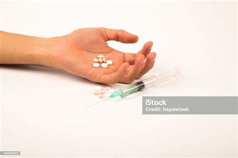 Ndrug Addiction Concept Passive Hand With Coat Pills And Injection On