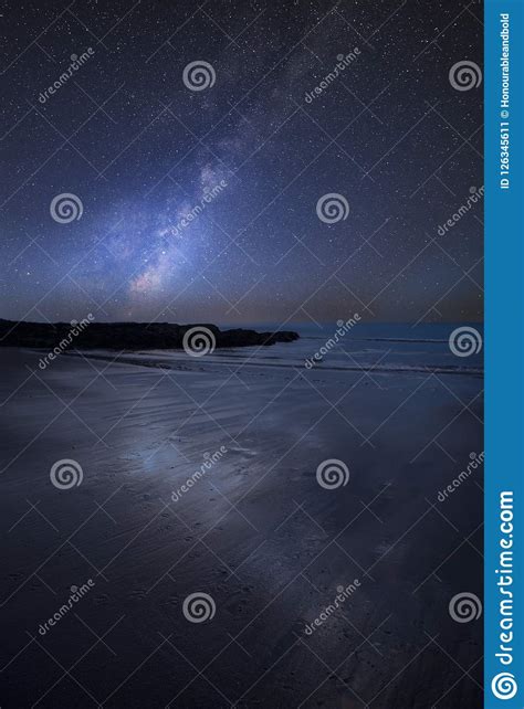 Vibrant Milky Way Composite Image Over Landscape Of Empty Beach Stock
