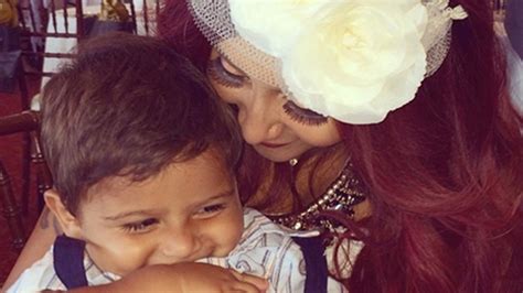 snooki snuggles with son lorenzo at bridal shower