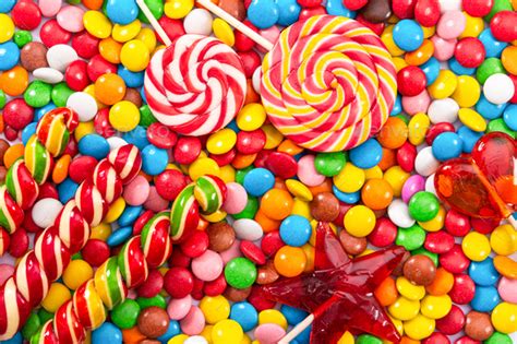 Colorful Lollipops And Different Colored Round Candy Stock Photo By