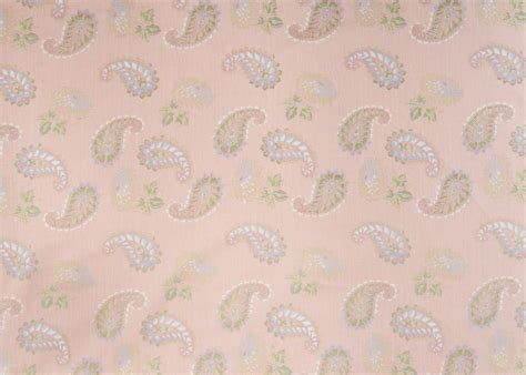 A Pink And Green Paisley Print Fabric