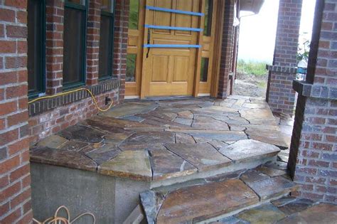 Outdoor swings provide a comfortable. Front porch flagstone in progress | Flagstone steps ...