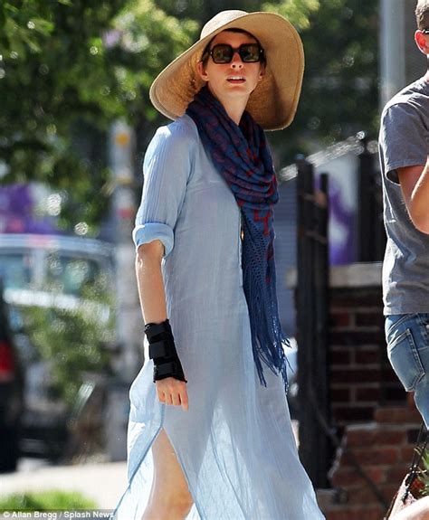 anne hathaway casts a see through summery look in sheer blue dress daily mail online