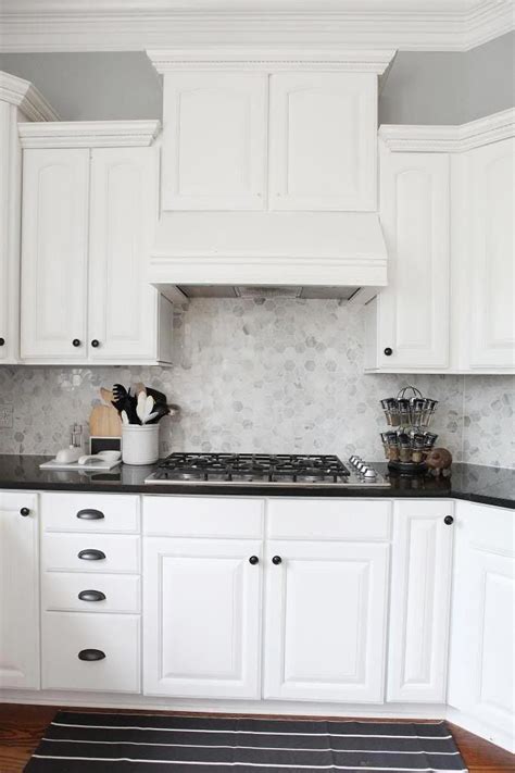Check spelling or type a new query. Kitchen: love the white cabinets with black countertops ...