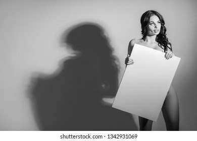 Sexy Naked Brunette Woman Holding Empty Stock Photo Edit Now