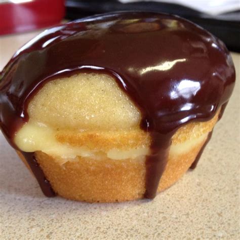 Their boston cream pie is a richer version, made with both vanilla and chocolate cream, and topped with a thick ganache. mini boston creme cup | Boston cream pie, Food, Cheesecake