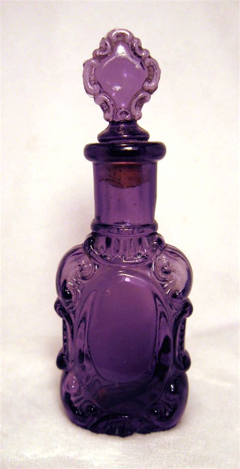 Elegant Vintage Perfume Bottle With Sun Purple Hue