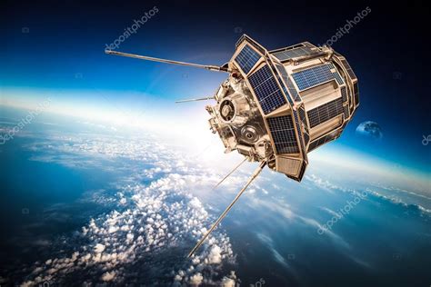 Space Satellite Orbiting The Earth Stock Photo By ©cookelma 95174482