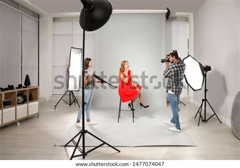 Professional Photographer Assistant Taking Picture Young Stock Photo