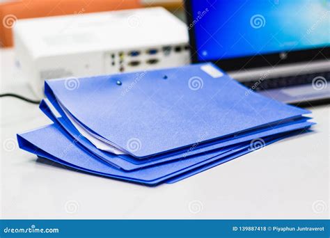Blue File Folder With Documents On The White Table Stock Photo Image