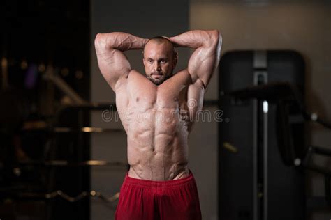 Muscular Man Flexing Muscles In Gym Stock Image Image Of Diet