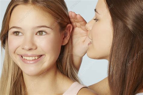 Teenage Girls Whispering To Each Other Stock Image F0070776 Science Photo Library