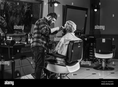 Trimming beard. Beauty routine. Barbershop services. Excellent barber