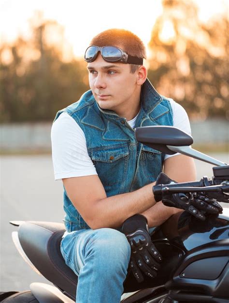 Biker Man Sitting On His Motorcycle Outdoors Stock Image Image Of