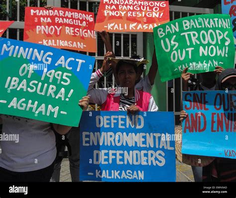 quezon city philippines 22nd apr 2015 filipino environmental activists hold up slogans