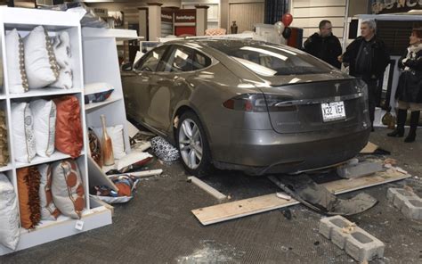 Tesla Model S Crashes Into A Store Driver Admits Error And Doesnt