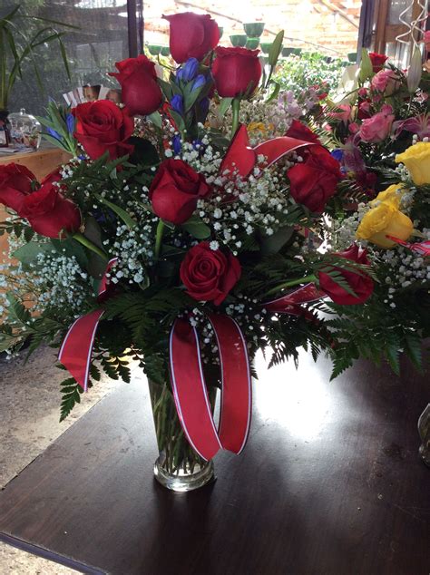 Two Dozen Red Roses In A Vase Flowers In A Vase Flower Arrangement In