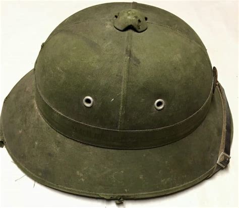 North Vietnamese Army Sun Helmet With Badge Bullethole Doves Flag And