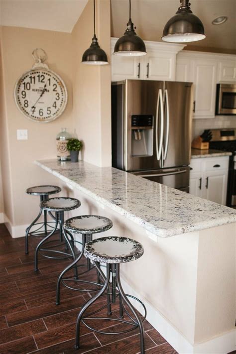 Watch the waves roll as you sip on your cocktail! white granite | The Dining Room & Breakfast Bar ...