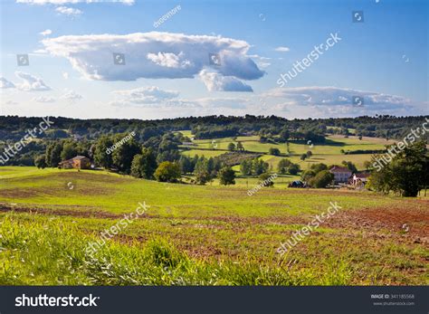 Summer Rural Landscape With A Farm And A Fileld In The Southern France