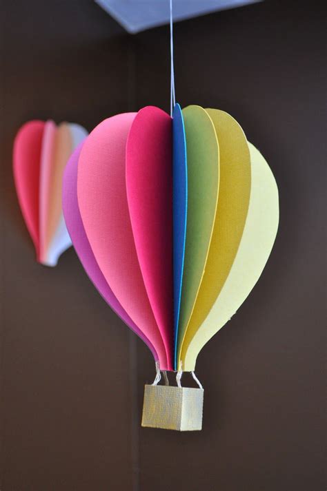 One example is this craft from i heart crafty things where you can arrange patterned tape vertically or horizontally to create colorful balloons. To tie in with The Games Maker I Am Momma - Hear Me Roar ...