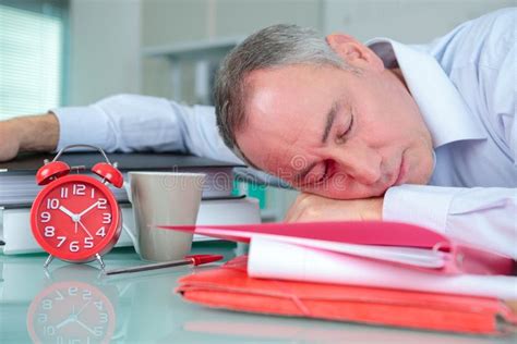 Office Worker Sleeping On Desk Stock Image Image Of Adult Young