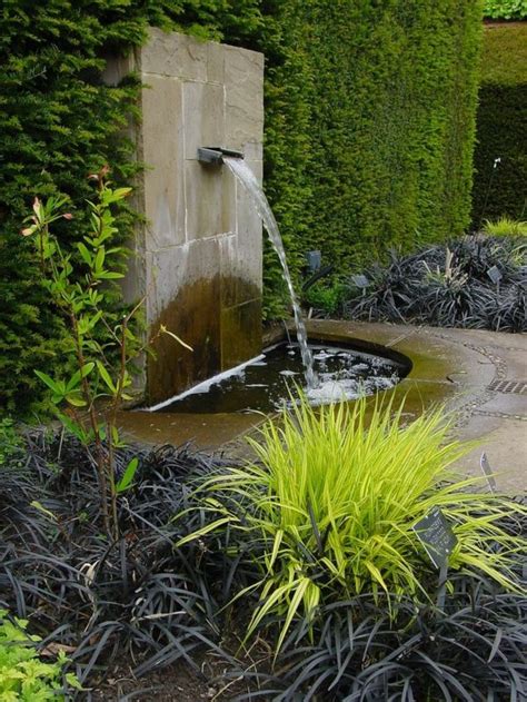 Décoration De Jardin Avec Une Fontaine Pour Bassin Archzinefr