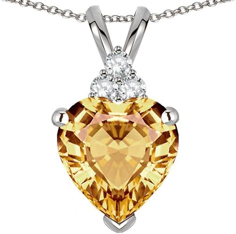 Star K Mm Heart Shape Simulated Imperial Yellow Topaz Three Stone