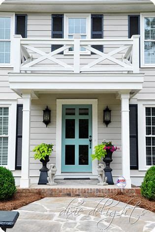 Or, black shutters on dark blue exterior. Bright turquoise storm door with light gray exterior and ...