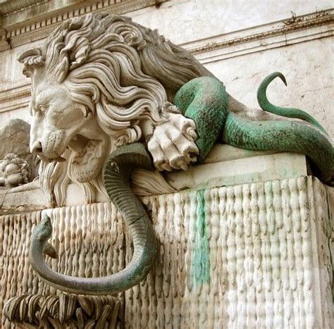 Snakes are quite dangerous but a lion is even more lions vs snakes elvirakitties. Odd medallion? - Friendly Metal Detecting Forums | Lion ...