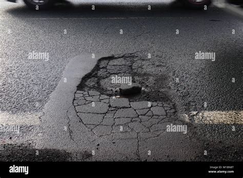 Pothole In The Road Stock Photo Alamy