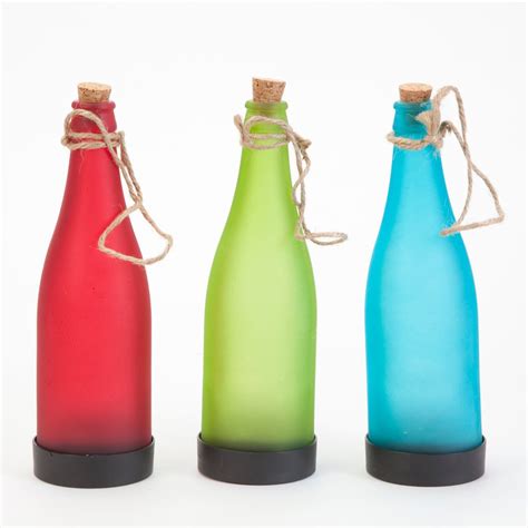 Bits And Pieces Light Up Solar Powered Hanging Glass Bottles Set Of 3 Red Green And Blue