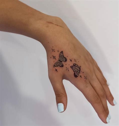 Top Butterfly Tattoo Hand Latest In Eteachers