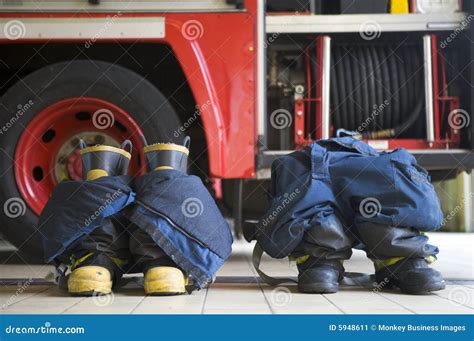 Firefighters Boots And Trousers In A Fire Station Stock Image Image