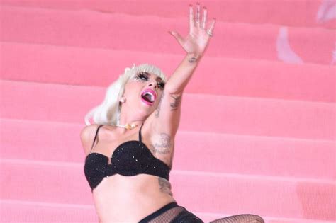 Lady Gaga Stuns With Strip Tease At The Met Gala