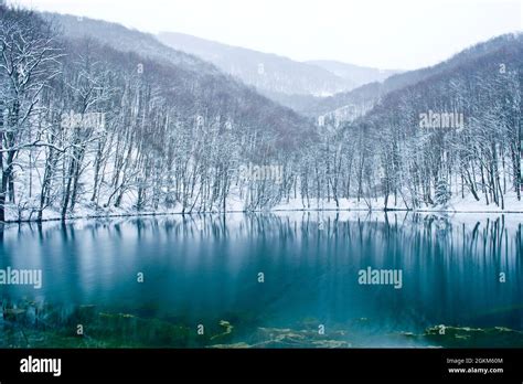 Beauty Blue Lake Between Snowy Mountain At Winter Szilvásvárad