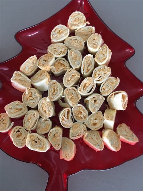 Toss in chicken with 1/2 cup buffalo wings sauce. BJ Brinker's Home Cooking: Buffalo Chicken Tortilla Roll Ups