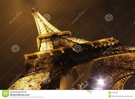 Illuminated Eiffel Tower At Night Editorial Photo Image Of Blue
