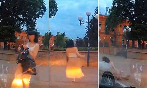 drunk woman caught on russian dashcam swaying staggering in circles on her way home