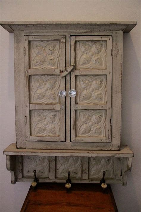 Repeat this process for each cabinet until all wall cabinets are hung. Pin by Coconut Darling on need in my house | Rustic wood walls, Primitive furniture, Wall cabinet