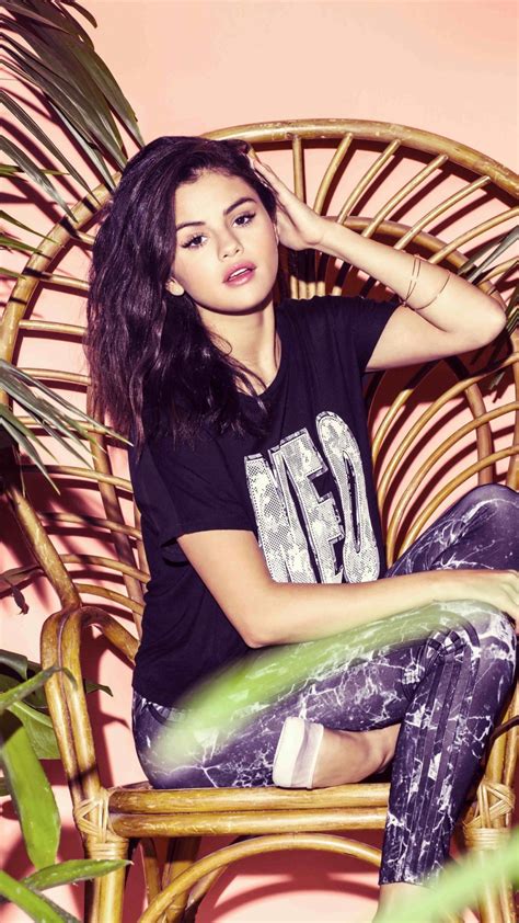 Download 1080x1920 Wallpaper Selena Gomez Sit Chair
