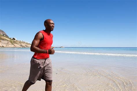 Young Black Guy Running Along The Seashore Stock Photo Image Of Afro