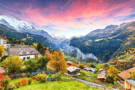 Premium Photo Stunning Autumn View Of Picturesque Alpine Village Wengen