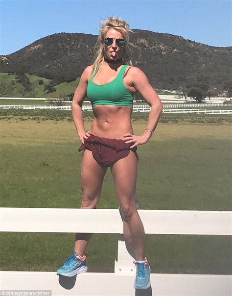 Britney Spears Flaunts Yoga Toned Figure On Fence Daily Mail Online