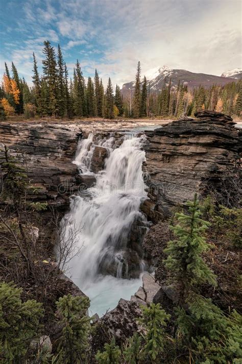 Athabasca Falls Rapids Flowing At Sunset In Icefields Parkway At Jasper